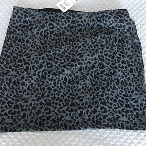 Fitted animal print mini skirt